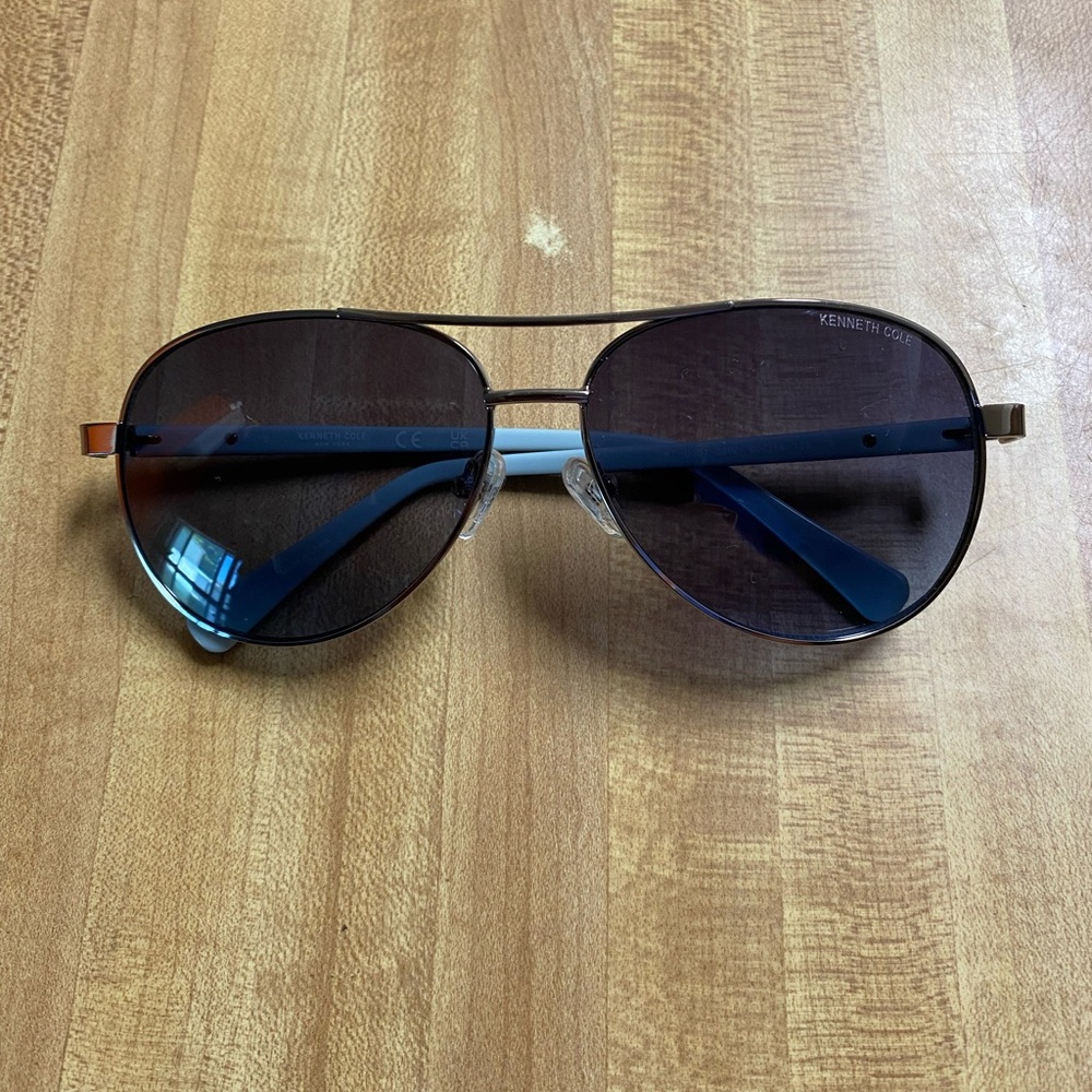 Kenneth Cole tortoise shell aviator sunglasses with blue trim